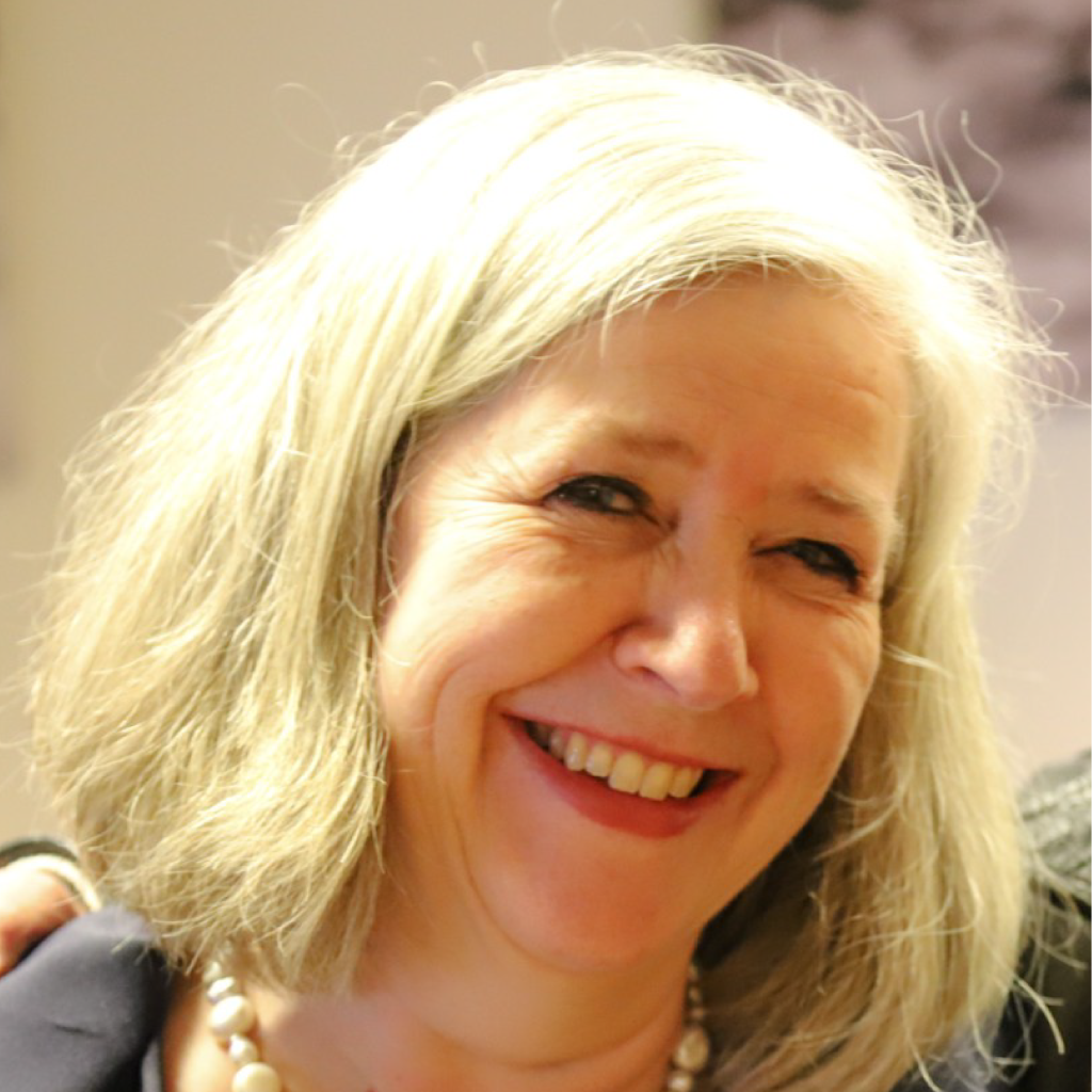 Kvinna som ler